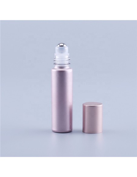 Bouteille roller en verre rose pailleté